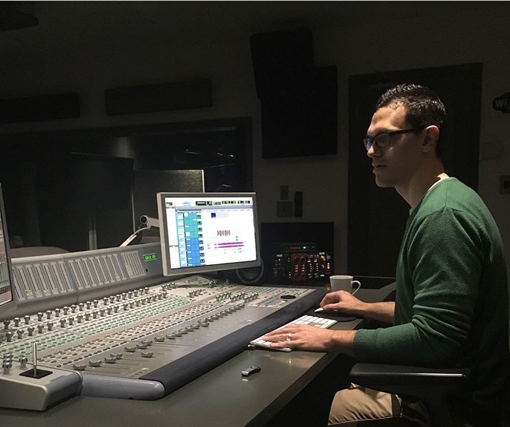 Engineer at an SSL mixing console